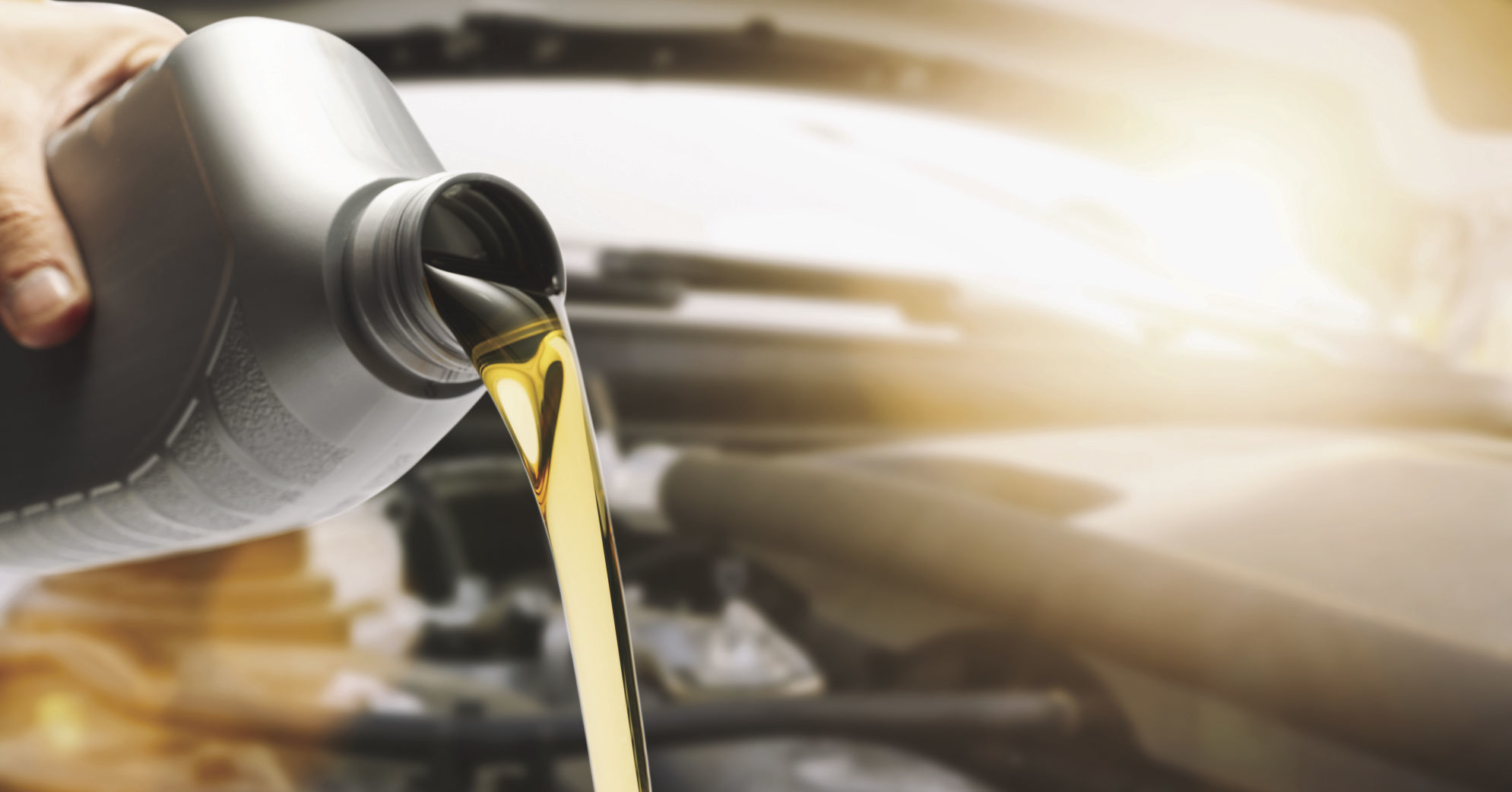 Hand mechanic in repairing car, Change the Oil